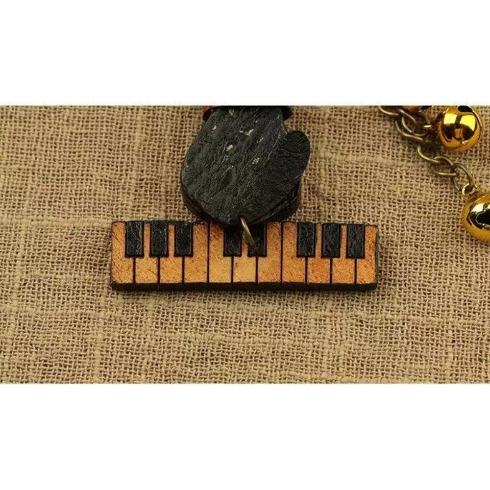 猫 キーホルダー 本革 ピアノ 猫モチーフ 魚の骨 鈴付き レザー バッグチャーム キーリング 音楽 楽器 ねこ ネコ おしゃれ かわいい プレゼント ギフト