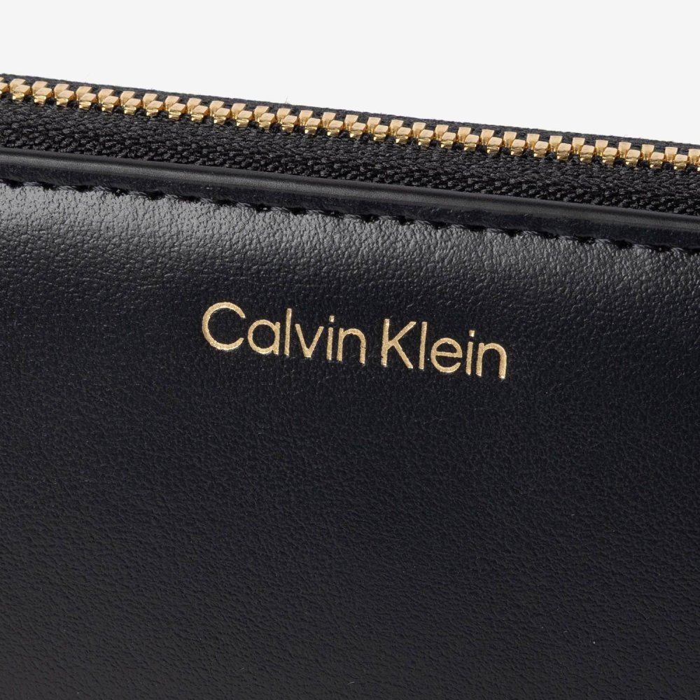 カルバンクライン Calvin Klein CK PULLER LARGE ZIP AROUND プラー ラージ ジップ アラウンドウォレット LV04F1093G 長財布 レディース 財布