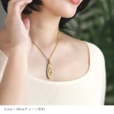 金属アレルギー対応 ペアネックレス ハワイアンジュエリー 純チタン ゴールドカラー ペアネックレス 刻印無料 誕生石 オーバル Lサイズ チェーン 長さ選べる イオンプレーティング カップル プレゼント ハロウィン 【品番：CG-TIP404L-RYP】