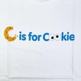 セサミストリート クッキーモンスター ユニセックスTシャツ(S) ロゴ ホワイト アパレル