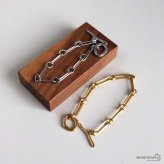 ステンレス マンテルブレスレット 変形デザイン 2カラー レディース チェーンブレスレット オーバルチェーン 曲線 バー 留め具 大ぶり 太め 個性的 存在感 モード カジュアル きれいめ 腕輪 シルバーカラー ゴールドカラー