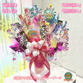 「周年祝い」「開店祝い」「誕生日」「推し活」「発表会」「表彰」「昇進祝い」「卒園・卒業」「入園・入学」「お菓子」「花束」「キャンディーブーケ」　季節を超えたお世話いらずのお菓子のブーケ♡　《お菓子の賞味期限は1ヶ月以上の物をご用意しております》『ポップコーン ピンキー』