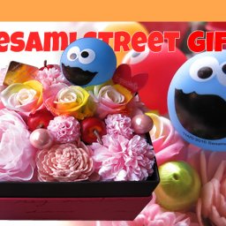 エルモ入り 花束風 ギフト レインボーローズ プリザーブドフラワー入り 箱を開けてサプライズ ボックス エルモ クッキーモンスター ビッグバードおまかせ1個入り