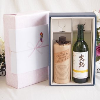 感謝の贈り物ボックス 琥珀の余韻と芳醇ワイン2本セット(アルプス 完熟 信州産ナイアガラワイン 白やや甘口12度(長野県) 長期貯蔵酒 百年の孤独40度(宮崎県)) 720ml×2本
