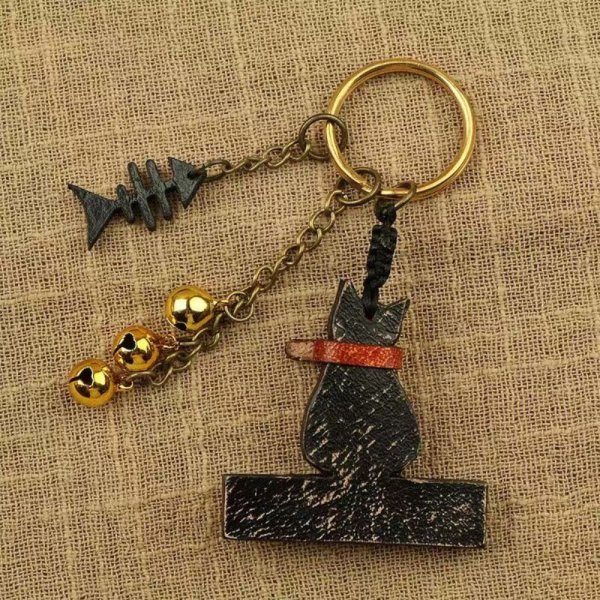 猫 キーホルダー 本革 ピアノ 猫モチーフ 魚の骨 鈴付き レザー バッグ