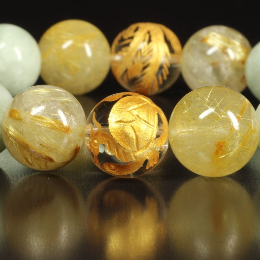 高級ルチル】 高級感あふれる［秘めた能力を開花させる］12mm 金彫四神